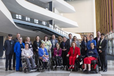 Australian delegates looking at the camera and smiling