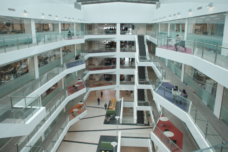 Top floor view of Enid Lyons Building showing central void and lower level floors below.